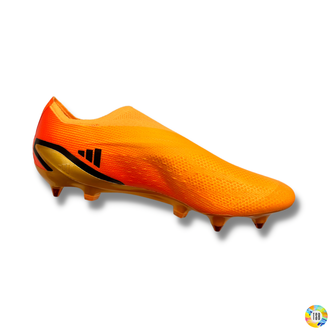 Orange and 2025 black adidas cleats