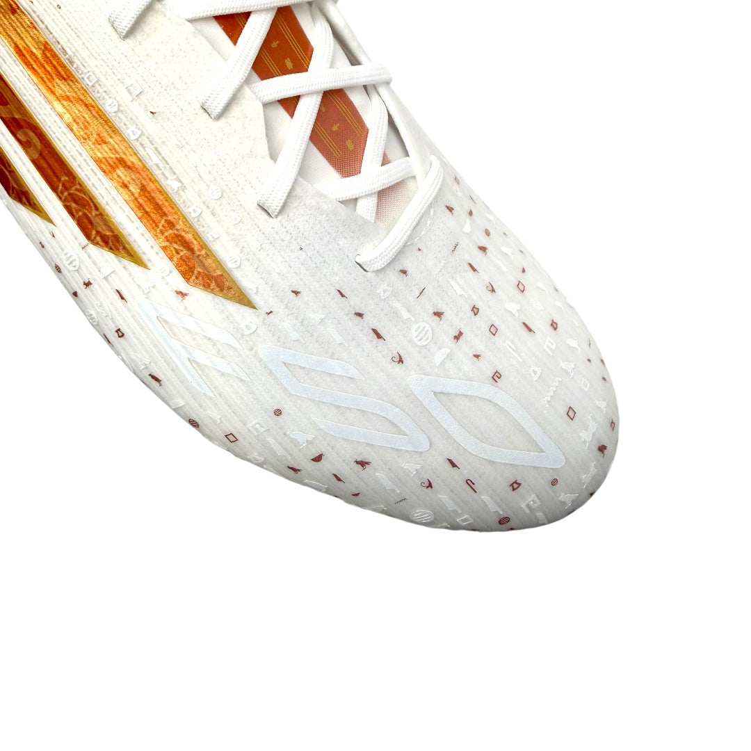 ADIDAS F50 ELITE X SALAH FG - Ftwr White/Golden Beige/Thermal Gold Met.